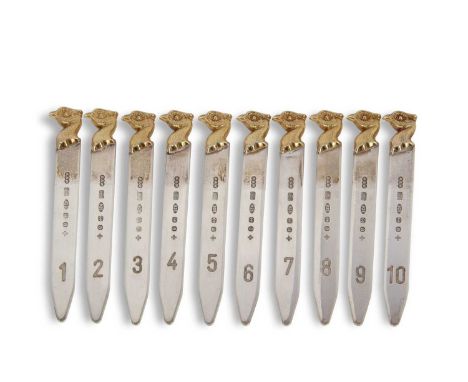 A cased set of silver pegg markers for the pheasant shooting party, a set comprising ten pegs number 1-10, each with a gilt p