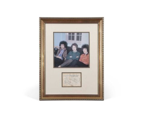 A framed and glazed presentation display for The Jimi Hendrix Experience. Containing a reproduction 19x19cm colour photograph