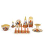 A group of Clarice Cliff crocus wares including a Bonjour shaped sifter together with a further