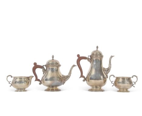 Elizabeth II silver four piece tea/coffee service comprising coffee pot, teapot, sugar bowl and cream jug of p lain baluster 