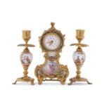 A small late 19th Century clock garniture, probably French with painted porcelain panels of