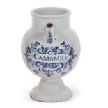 An 18th/19th Century delft drug jar probably Dutch with blue painted central cartouche and