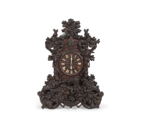 Camerer Kuss, Tritschler &amp; Co, 522 Oxford Street, London, a Black Forest cuckoo clock of eleborate form, the case with ex