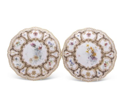 A pair of Royal Worcester plates with shaped gilt rims decorated with flowers and bugs, with armorial, probably for Colonel W