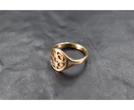 A 9ct gold signet ring with overlaid cut panel, size P &amp; approx 4.4g
