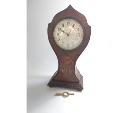 A French mantel clock with key 