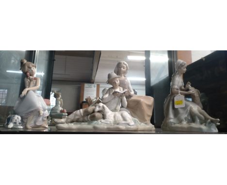 Lladro seated girl on telephone 20cm high, seated shepherds group 30cm wide, and Nao girl with hound 23cm high. (3) 