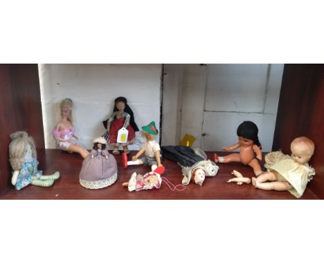 Mattel Barbie doll and eight other small dolls (9) 