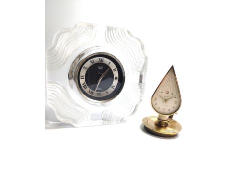 A Swiss mantel clock (Glass) and a brass mantle clock 