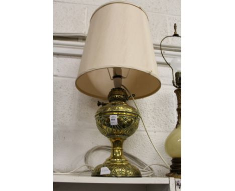 A brass oil lamp converted to electricity