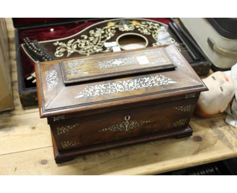 A good 19th century mother of pearl inlaid  rosewood tea caddy