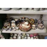 A quantity of lustre decorated china to include teapots together with Masons ironstone plates and