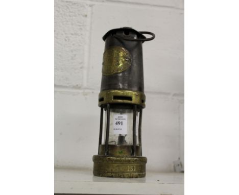 A miners lamp by Thomas and Williams Aberdare