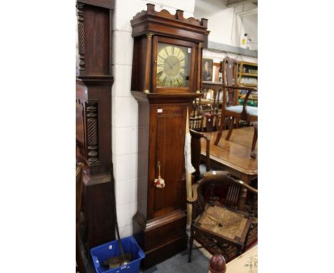 A 19th century oak longcase clock with thirty hour movement the square brass dial signed Benjamin Shuckforth Diss Norfolk