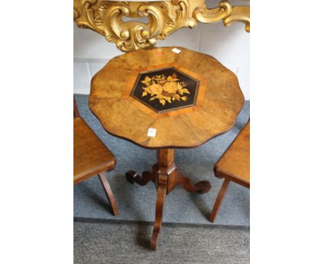 A 19th century inlaid walnut tilt top tripod occasional table