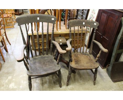 Two stickback Windsor chairs and a tripod table