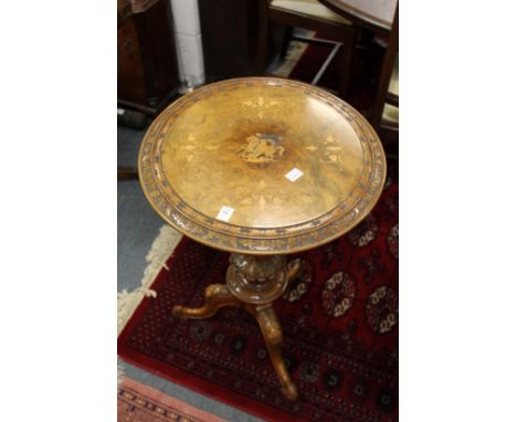 A Victorian inlaid walnut tripod table (lacking some inlay)