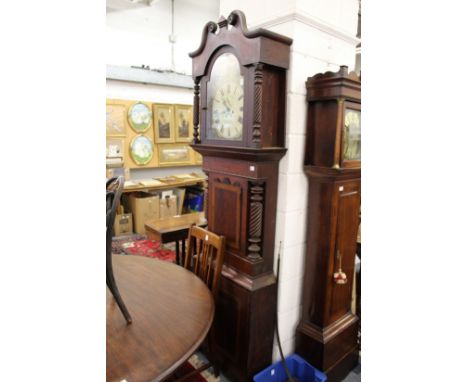 A large 19th century mahogany longcase clock  with painted arched dial signed R Hughes Llangollen (?)