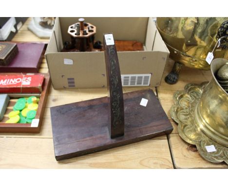 A Regency brass inlaid rosewood clock bracket