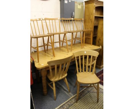 Three beech kitchen chairs and a set of four stick back kitchen chairs