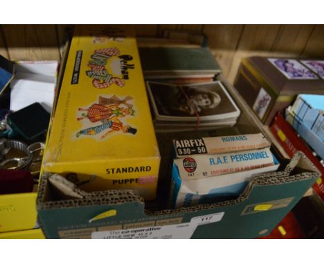 A box containing post-cards, maps, Pelham puppet etc. 