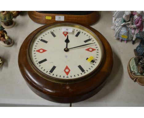 An RAF type wall clock contained in mahogany case with battery powered movement