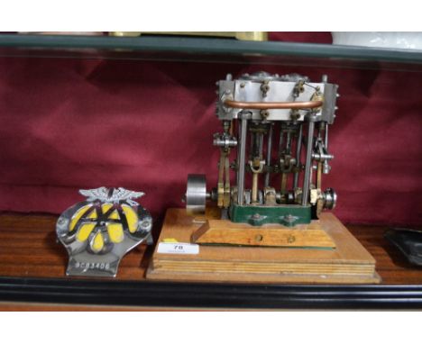 A working model steam engine with an AA badge 