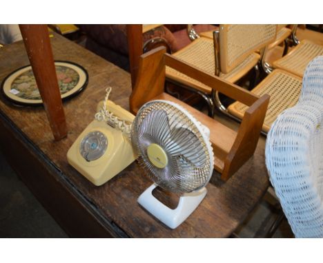 An oak book rack and table top fan (sold as collector's item) together with a rotary telephone