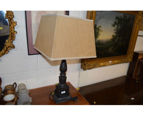 A metal table lamp and shade 