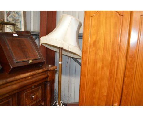 A copper and wrought iron standard lamp and shade 