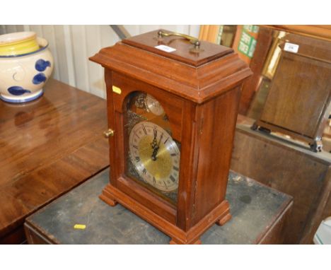 A Tempist Fugit mahogany cased mantel clock