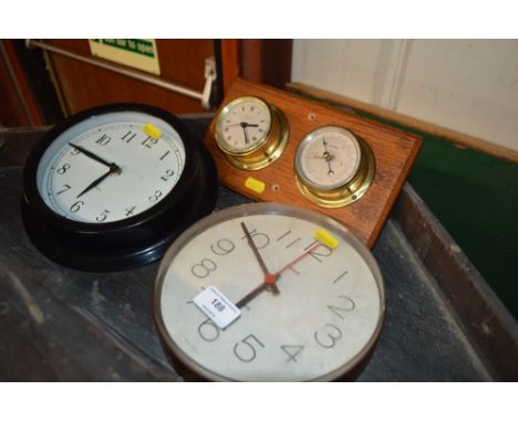 Two wall clocks and a clock and barometer set 
