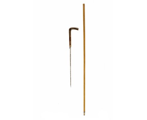 A GOOD LATE GEORGIAN DAGGER-STICK, circa 1810, 33 1/4in. overall with slender cane shaft concealing an 11in. fancy square-sec