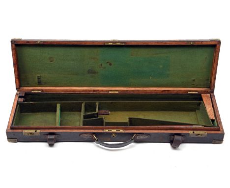 WESTLEY RICHARDS A BRASS-CORNERED LEATHER-BOUND OAK SINGLE GUNCASE, fitted for 30in. barrels, the interior lined with green b