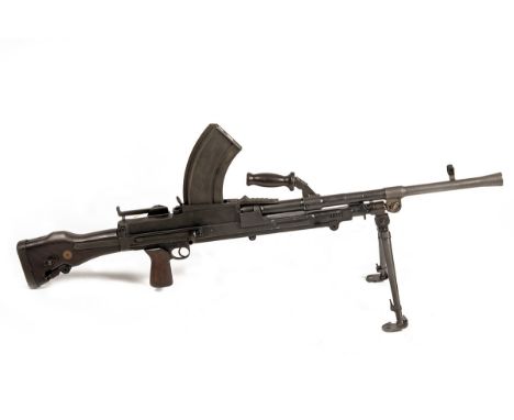 A CASED DEACTIVATED .303 BREN 'MKI*' LIGHT MACHINEGUN, serial no. P5486, dated for 1942, latest UK specification with some mo