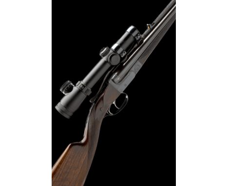 JULES BURY A .35 WINCHESTER BOXLOCK EJECTOR DOUBLE RIFLE, serial no. 7918, for 1930, 24 3/4in. nitro chopperlump barrels, rai