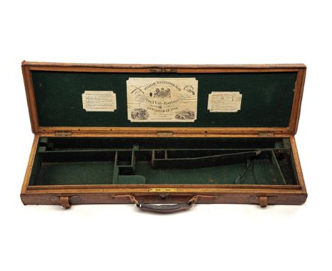 A BRASS-CORNERED OAK AND LEATHER SINGLE HAMMERGUN CASE, fitted for 30in. barrels (could adapt to 31 1/2in.), the interior lin