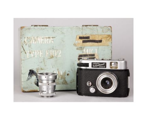 Robot Volumatic Star II Outfit, with a 30mm F3.5 Xenagon and a 75mm F3.8 Tele-Xenar lenses in a wooden case marked 'Camera, A