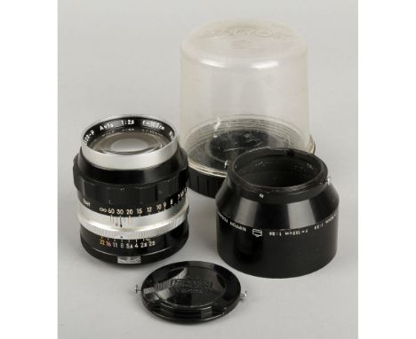A Nikon Nikkor-P f/2.5 105mm Lens, early 'Tick Mark' version, black, serial no. 120196, body, VG, elements, VG, some light fu