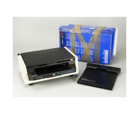 10x8 Polaroid Processor,  in fibre transit case with a a quantity of Polaroid 10x8 film (2) 