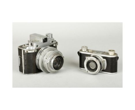 Kodak Cameras, a Medalist I with a 100mm F3.5 Ektar, Kodak 35 with a 26mm F2 Kodak Anastigmat, both with broad arrow engravin
