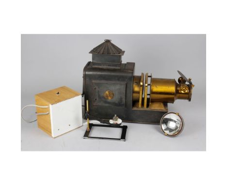 A Walter Tyler Russian iron and Brass Magic Lantern, with brass barrel 6in lens with rack and pinion focusing, metal oblong c