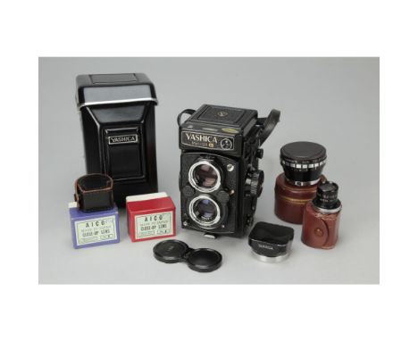 Yashica 124 G Camera, No 082783, in maker's case with accessories, body, E, elements, E 