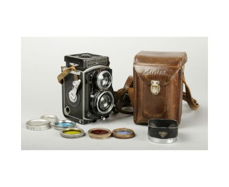 Rolleiflex 4 x 4 Sport, no. 734496, with Zeiss Tessar f/2.8 60mm lens, no. 2262725, in Compur-Rapid shutter, in maker's erc, 