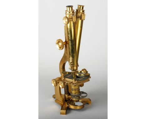 A 19th Century Harvey Reynolds & Co Leeds lacquered brass Wenham Compound Binocular Microscope, with pair of eyepieces, mecha
