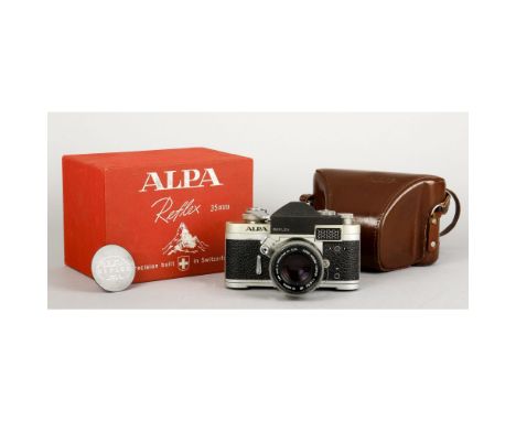 An Alpa 6c Camera, chrome with a champagne-coloured top plate no.43569, with an F1.8 Kern-Macro-Switar 50mm lens no.932969, b