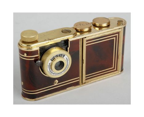 Petie Vanity Camera,  burgundy marble with gilt metalwork, body, G, a few chips in the enamel 