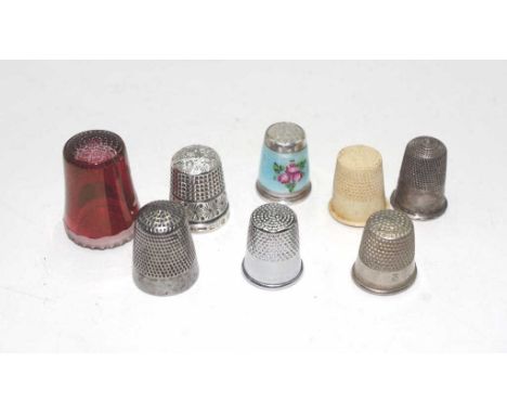 Two sterling silver thimbles to include one with hallmarked Chester 1901 and one marked German sterling, together with 4 silv