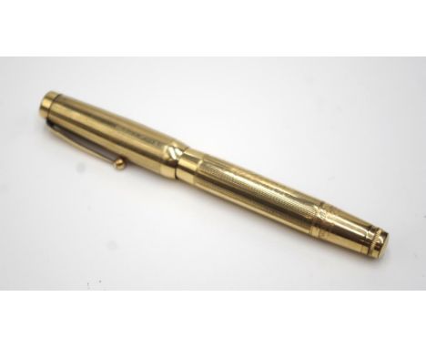 "Swan" vintage gilt metal fountain pen made by Mabie Todd, England. With a 14ct gold nib