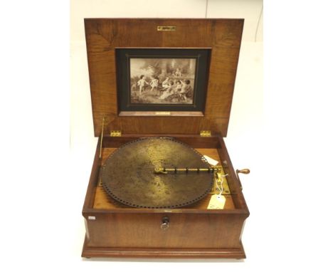 19th century walnut cased Polyphon by Briese, J Eckhardt, Frankfurt Main, with decorative lid and photograph of cherubs danci